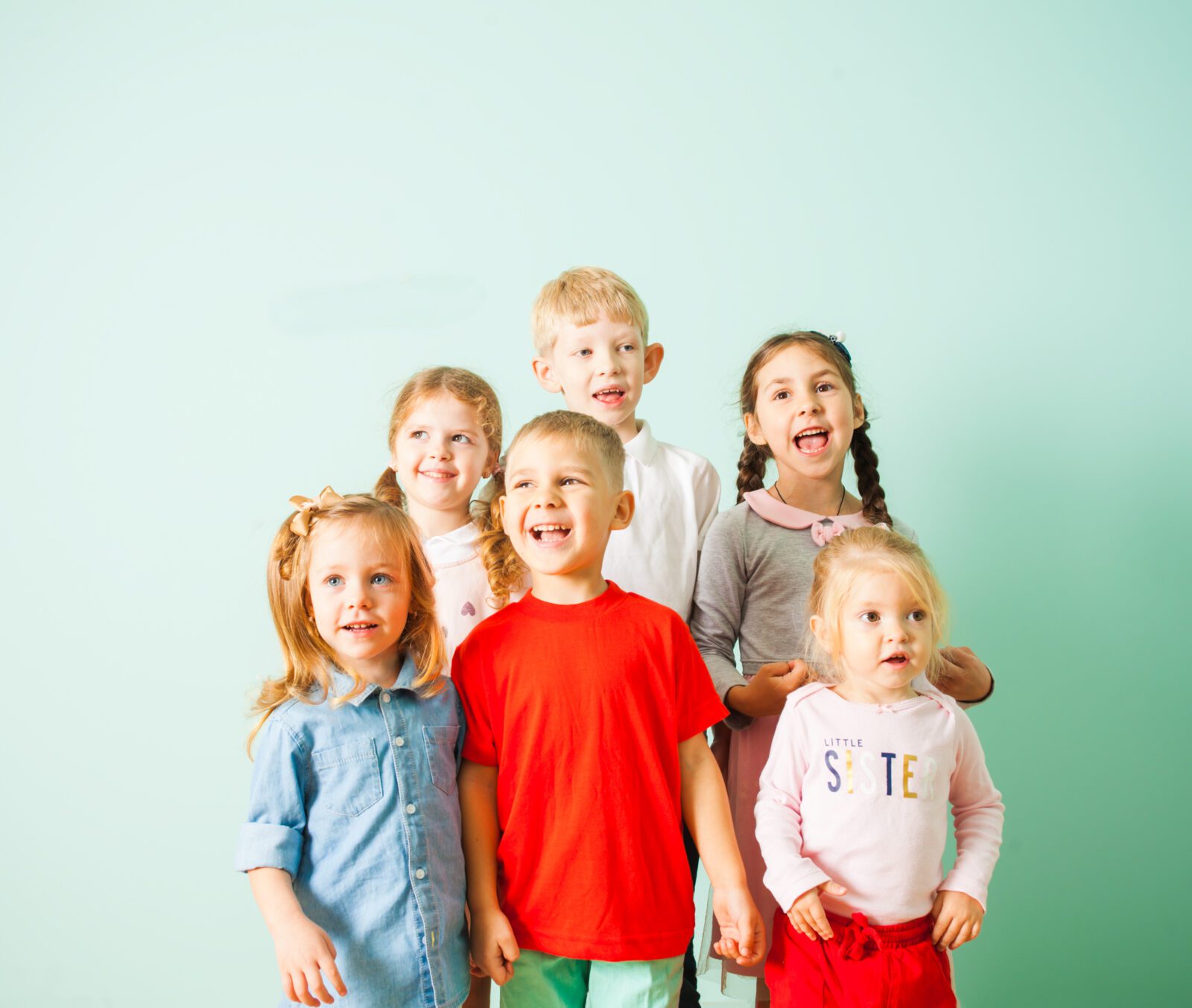 Group of children smiling for school picture day