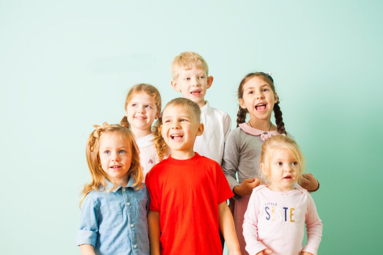 Group of children smiling for school picture day