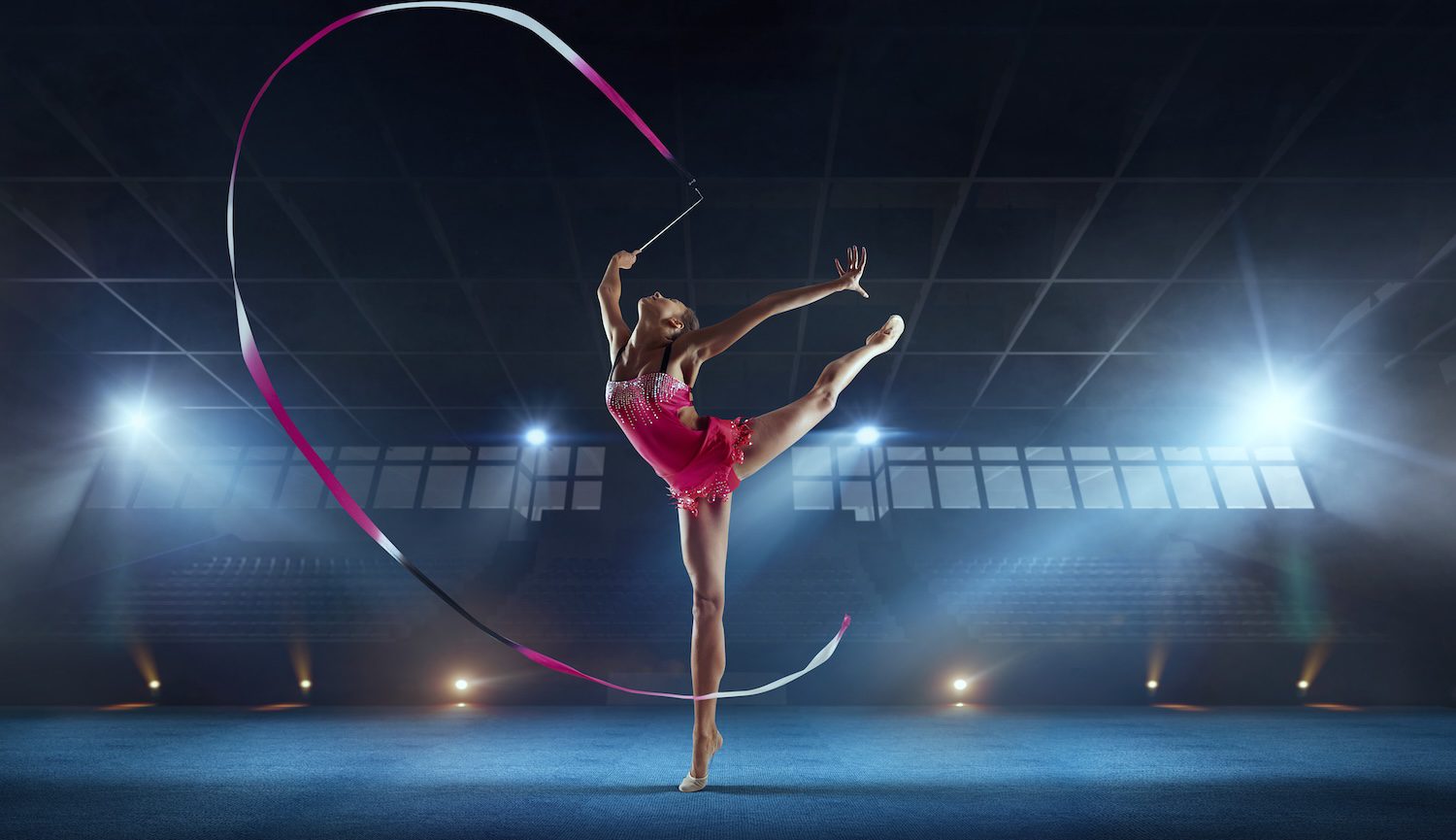 rhythmic gymnast waving ribbon