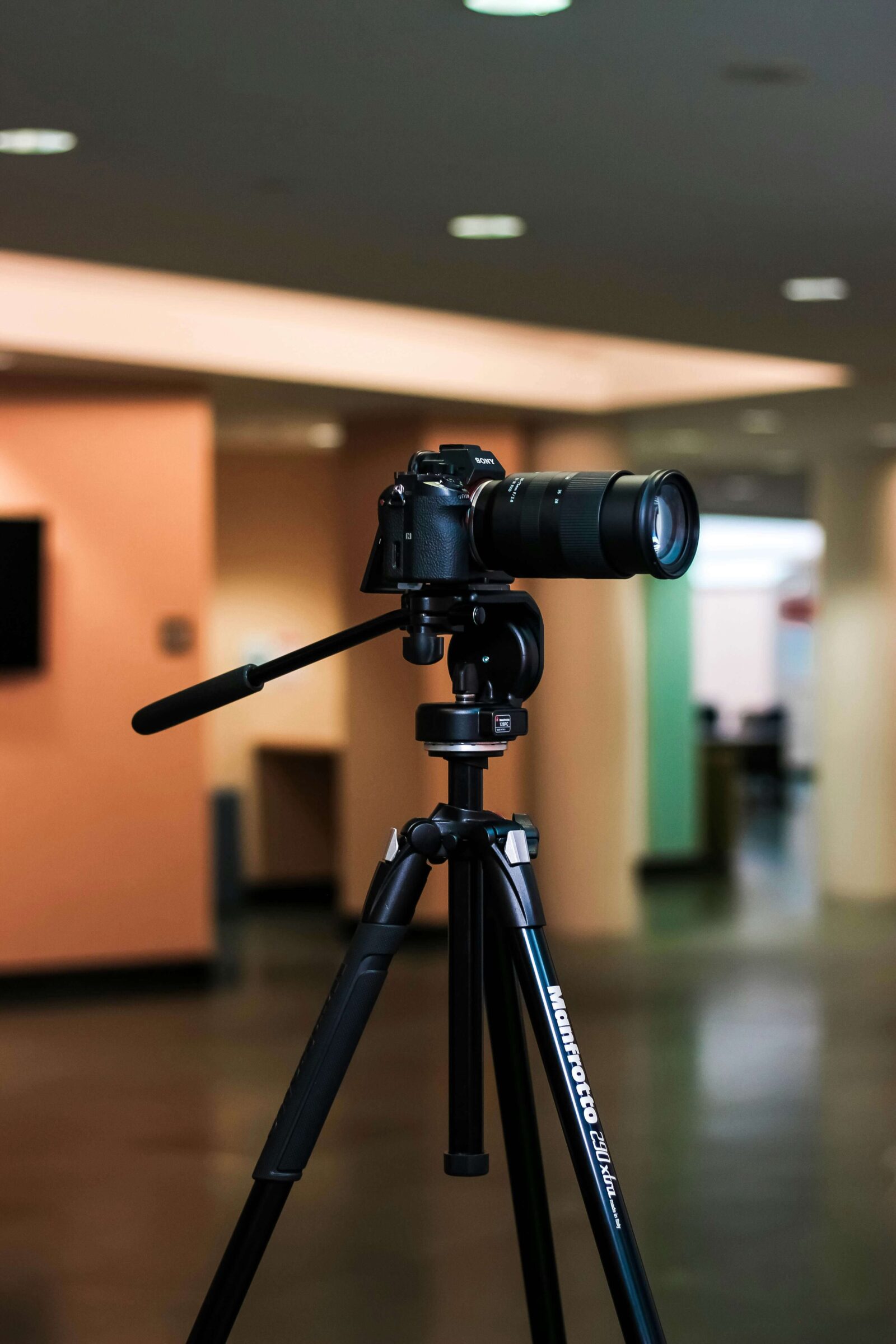 A camera on a tripod, an essential piece of camera equipment