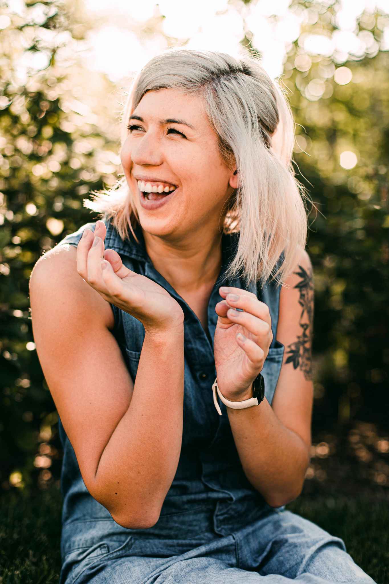 A woman smiles for portrait photography, at ease in front of the camera