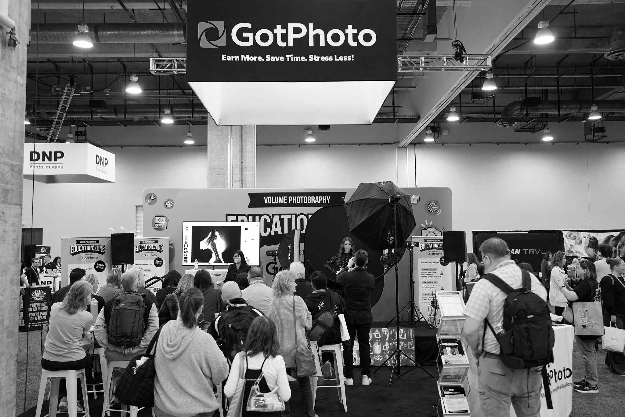 GotPhoto brand ambassador Sheryl Bashore speaks at the Education Zone during Imaging USA alongside a live shoot